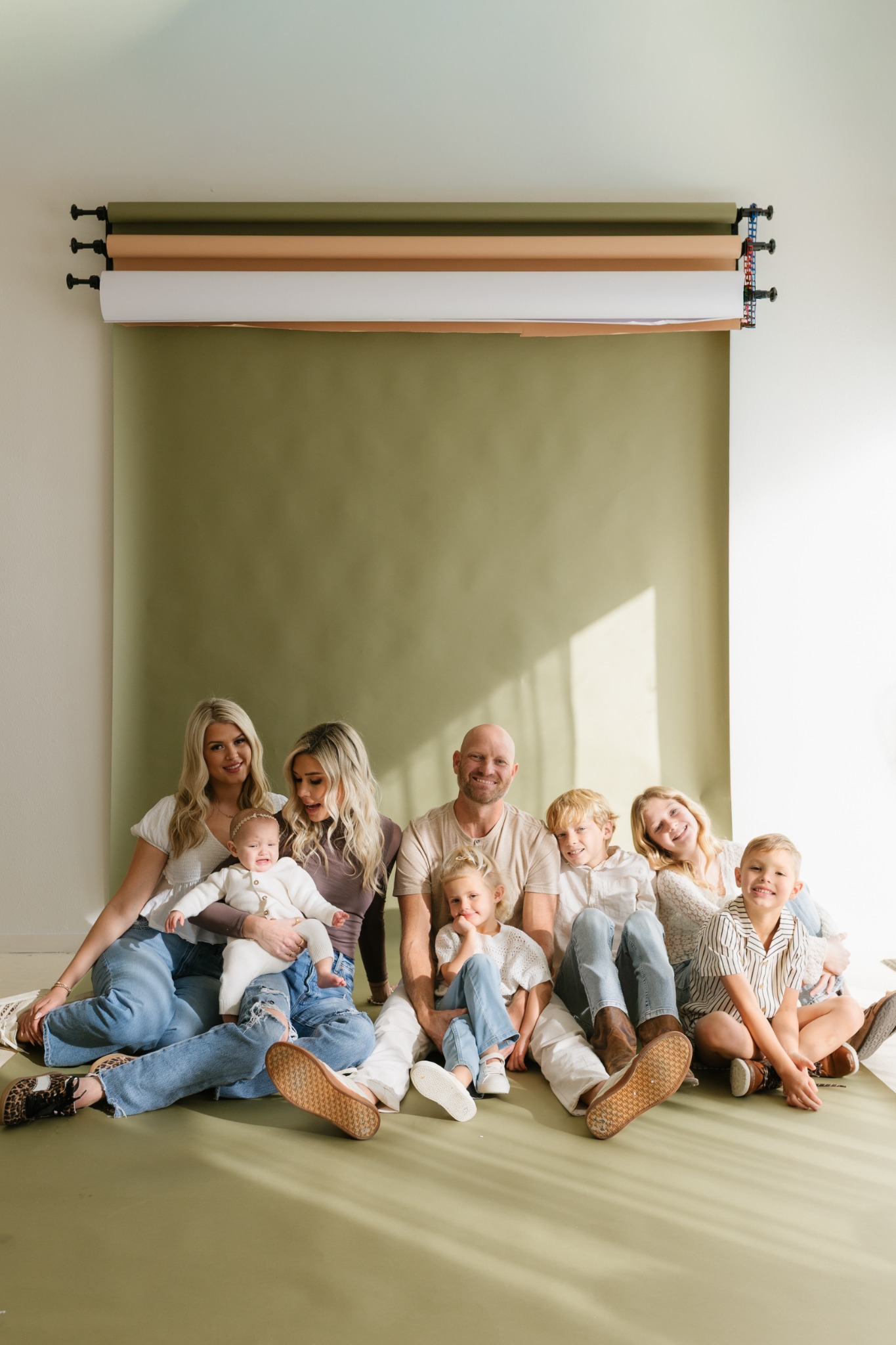 The full Trader Jones family in a relaxed professional studio portrait